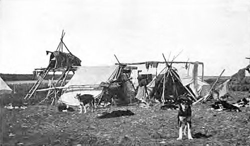 AN ENCAMPMENT OF ESKIMOS ON THE BEACH AT FORT
McPHERSON